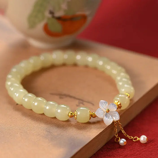 Bracelet de la Chance Orientale en Jade Naturel Sakura  Bracelet en Argent Sterling 925 avec Fleur de Cerisier et Conque Orientale